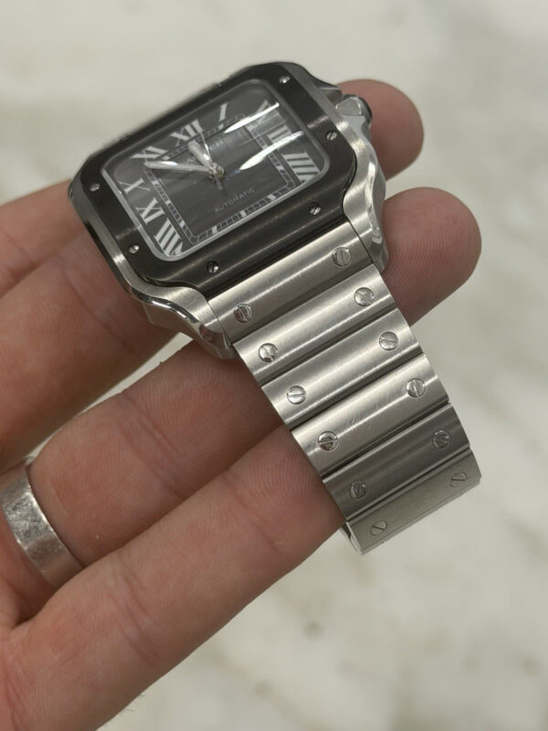 57_0d4be2ea-3ce6-4616-a4a9-282b44612115 Cartier Santos Stainless Steel Grey Dial 39.8mm Automatic Men’s Watch WSSA0037