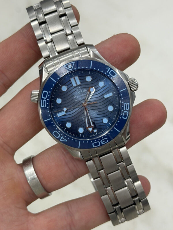 57_66639b38-3590-49be-88b9-75dcd5dc9bfe Omega Seamaster Diver 300M Summer Blue Edition 42mm 210.30.42.20.03.003 – B/P