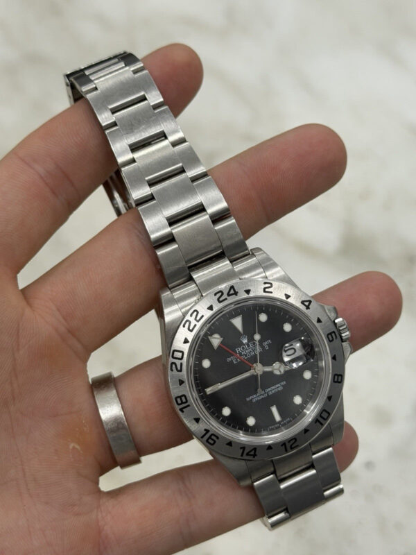 57_7c6a8109-8af5-4a83-9f61-964483f0fb4b Rolex Explorer II Stainless Steel Black Dial 40mm Automatic Mens Watch 16570