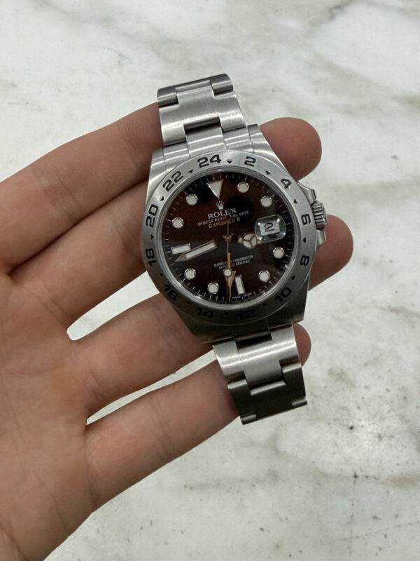 57_c424fcfd-72d0-4142-be6d-4301680df264 Rolex Explorer II Stainless Steel Black Dial 42mm Automatic Mens Watch 216570