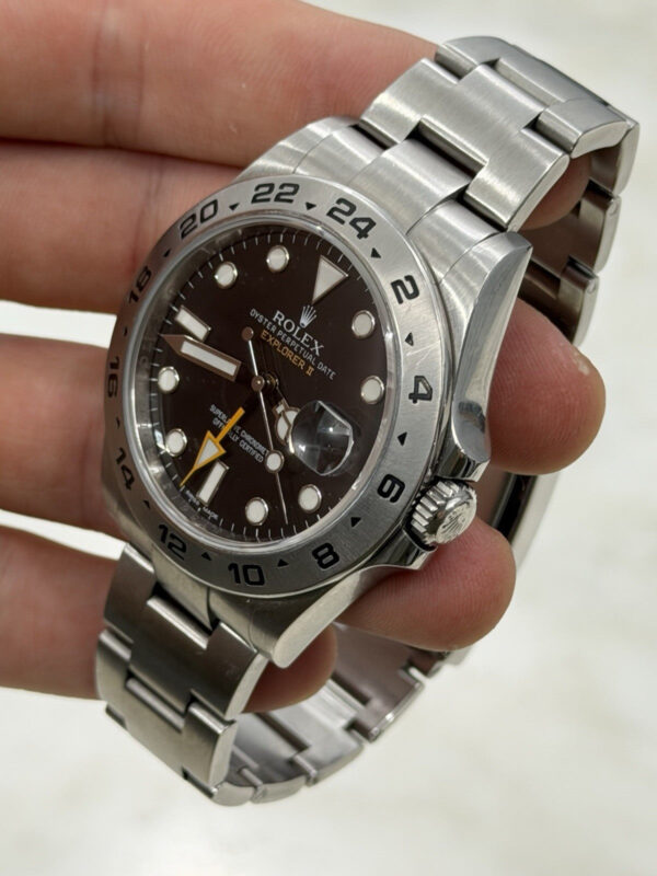 57_c9b505d5-125c-4ec8-b7d1-fe5a1cb9a830 Rolex Explorer II Stainless Steel Black Dial 42mm Automatic Mens Watch 216570