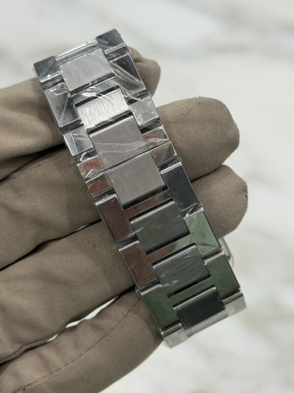 57_f5d054bd-d4ae-4ef0-abd0-b722f898f39f Cartier Tank Solo XL 3515 Stainless Steel 31mm Automatic Mens Watch W5200028